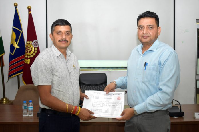 A participant receiving certificate on conclusion of a training programme at SKPA Udhampur. A participant receiving certificate on conclusion of a training programme at SKPA Udhampur.