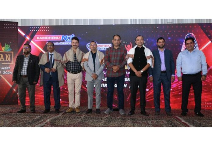 Pankaj Aggarwal, MD of Vijay Steel Industries posing alongwith others during a function in Srinagar on Wednesday.