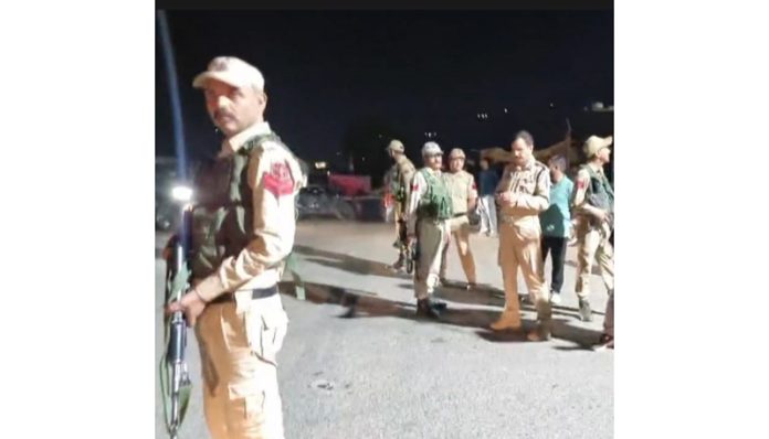 Cops near the site where movement of suspects was observed in Rajouri town. Cops near the site where movement of suspects was observed in Rajouri town.