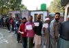 Long queue of voters at Agrikalan Pattan in Baramulla district on Tuesday. -Excelsior/Shakeel