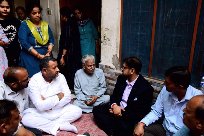 Minister for FCS&CA Satish Sharma meeting family of Shashi Abrol on Friday. Minister for FCS&CA Satish Sharma meeting family of Shashi Abrol on Friday.