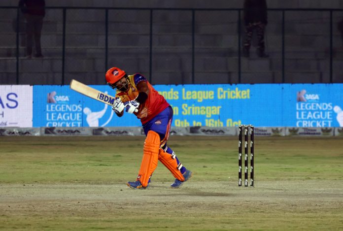 Players in action during LLC match between Konark Suryas Odisha and Toyam Hyderabad at Bakshi Stadium in Srinagar on Monday. -Excelsior/Shakeel