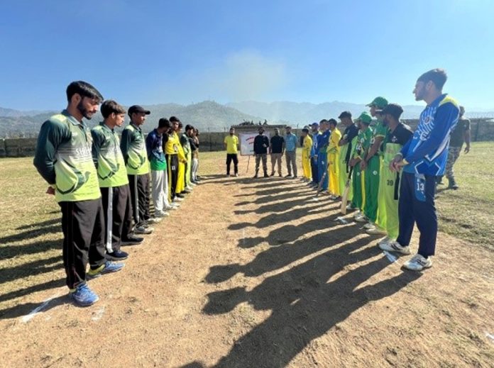 Teams posing for group photograph before start of the match at Surankote, Poonch. Teams posing for group photograph before start of the match at Surankote, Poonch.