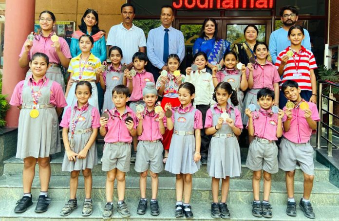 Students of Jodhamal posing along with medals. Students of Jodhamal posing along with medals.