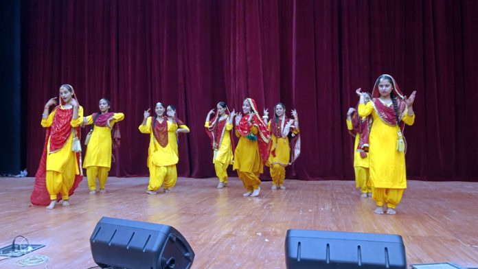 Girls performing a folk dance during a programme at Reasi. Girls performing a folk dance during a programme at Reasi.