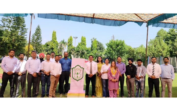 Representatives of different universities posing along with management of DPS during a programme at Kathua.