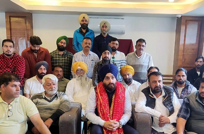 Members of All J&K Transport Welfare Association during a press conference in Srinagar on Friday. -Excelsior/Shakeel Members of All J&K Transport Welfare Association during a press conference in Srinagar on Friday. -Excelsior/Shakeel