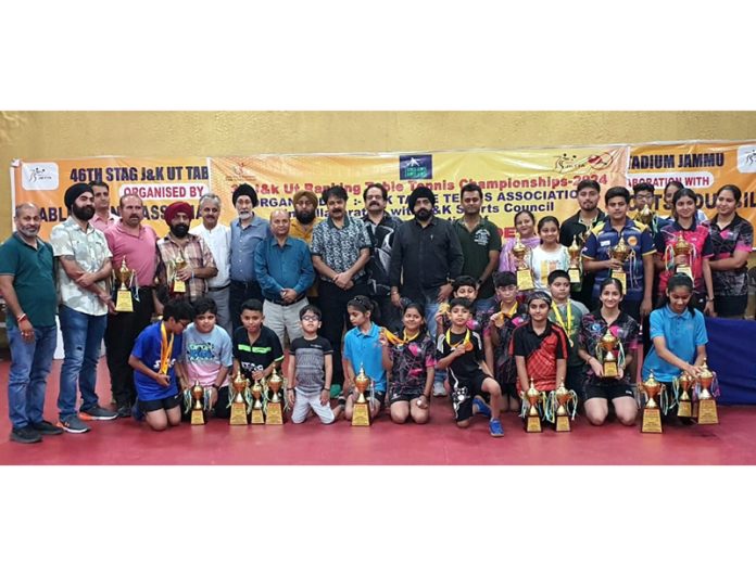 Table Tennis players posing along with dignitaries during prize distribution ceremony at Jammu.