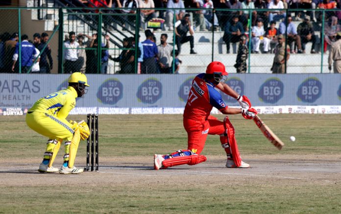 A batsman playing a shot during Legends League eliminator match between India Capitals and Toyam Hyderabad at Bakshi Stadium in Srinagar on Sunday. -Excelsior/Shakeel