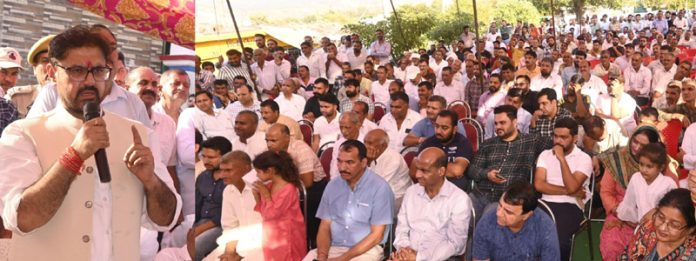 Minister for FCS&CA Satish Sharma addressing a public gathering in Chhamb constituency. Minister for FCS&CA Satish Sharma addressing a public gathering in Chhamb constituency.