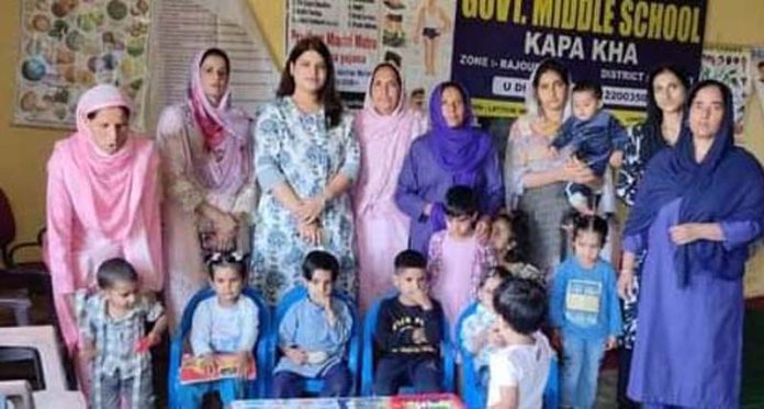 CDPO Rajouri Aditi Singhaal with children and others at an Anganwadi centre. CDPO Rajouri Aditi Singhaal with children and others at an Anganwadi centre.