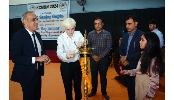 Chief guest lighting lamp during a programme. Chief guest lighting lamp during a programme.