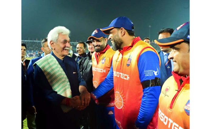 LG Manoj Sinha interacting with players during final match of LLC at Bakshi Stadium, Srinagar on Wednesday. LG Manoj Sinha interacting with players during final match of LLC at Bakshi Stadium, Srinagar on Wednesday.