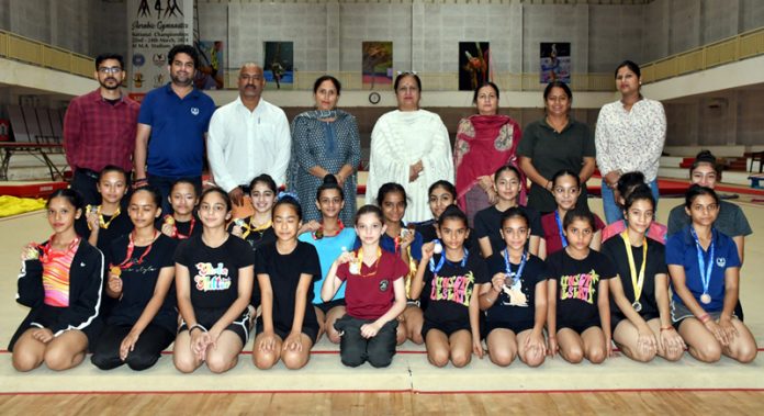 Young gymnasts posing during closing ceremony at Jammu. Young gymnasts posing during closing ceremony at Jammu.