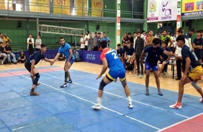 Players in action during a Basketball match at Jammu University.