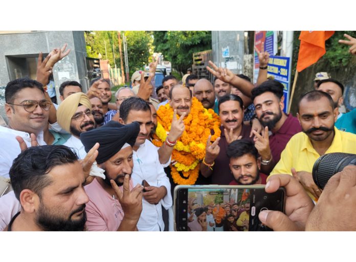 Senior BJP leader Devender Singh Rana showing victory sign after being declared winner from Nagrota Assembly segment. —Excelsior/Rakesh Senior BJP leader Devender Singh Rana showing victory sign after being declared winner from Nagrota Assembly segment. —Excelsior/Rakesh