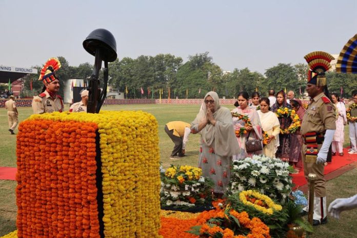 Family members paying tribute to the police Martyrs on Police Commemoration Day at Gulshan Ground in Jammu on Monday. (UNI) Family members paying tribute to the police Martyrs on Police Commemoration Day at Gulshan Ground in Jammu on Monday. (UNI)