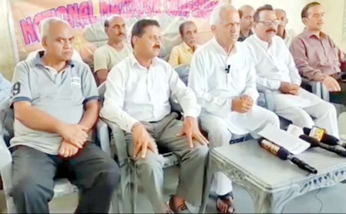 NMC president, Subash Shastri addressing a meeting at Jammu on Sunday.