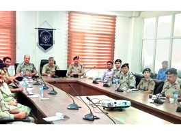 DIG Traffic Jammu Dr Mohammad Haseeb Mughal, chairing a meeting of police officers in Jammu on Thursday.