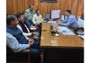 CCI Jammu president Arun Gupta and other office bearers in a meeting with the Commissioner State Taxes Department.