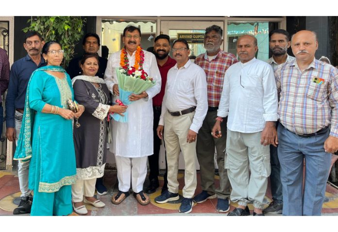 MLA Jammu West Arvind Gupta during a meeting with Supervisors Union of JMC on Tuesday.