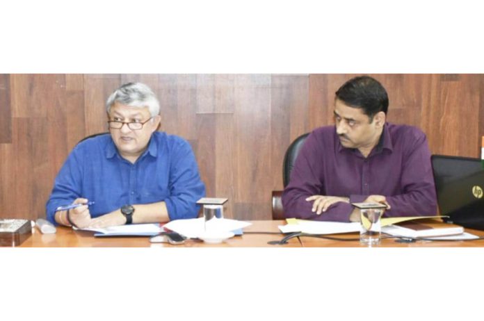 DC Reasi Vishesh Mahajan chairing a meeting.