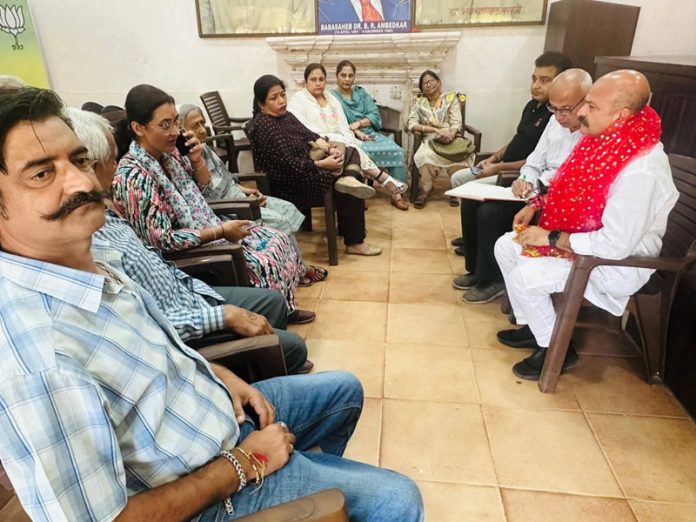 BJP MLA from Jammu East, Yudhvir Sethi listening public grievances at party office Jammu on Friday. BJP MLA from Jammu East, Yudhvir Sethi listening public grievances at party office Jammu on Friday.