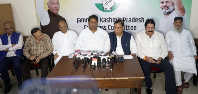 J&K Cong working president flanked by Mula Ram, Ravinder Sharma and others addressing joint press conference in Jammu. -Excelsior/Rakesh J&K Cong working president flanked by Mula Ram, Ravinder Sharma and others addressing joint press conference in Jammu. -Excelsior/Rakesh