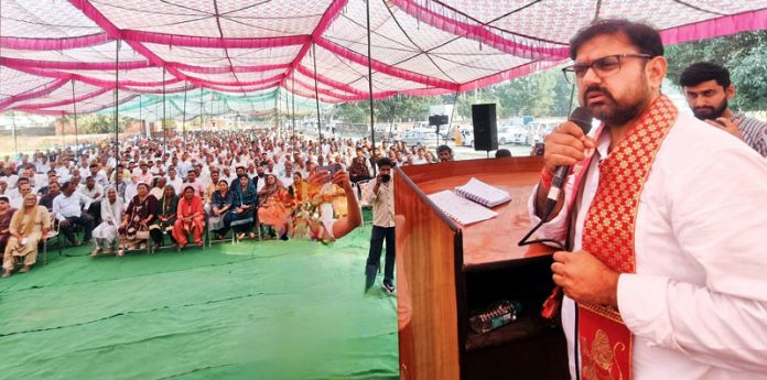 Minister Satish Sharma addressing a public meeting in Khour on Monday. Minister Satish Sharma addressing a public meeting in Khour on Monday.