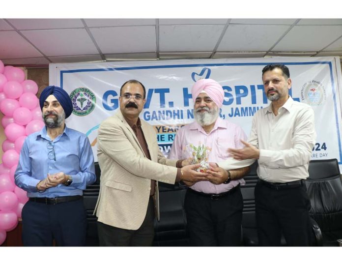 CMO Jammu Dr Harbaksh Singh along with MS of Government Hospital Gandhinagar, Dr Abdul Hamid Zargar and others during an event in the hospital premises.