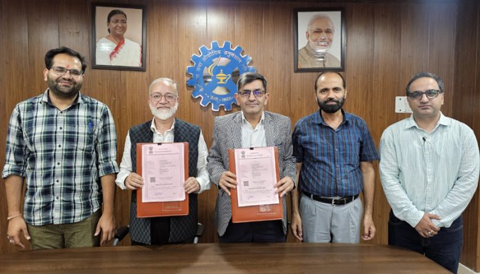 Director CSIR-IIIM and MD HAPICO displaying copies of MoU. Director CSIR-IIIM and MD HAPICO displaying copies of MoU.