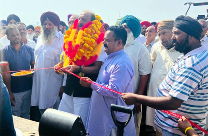 BJP vice president and MLA Samba, Surjit Singh Slathia inaugurating the road from Sunjwan Camp to Harimandir. BJP vice president and MLA Samba, Surjit Singh Slathia inaugurating the road from Sunjwan Camp to Harimandir.