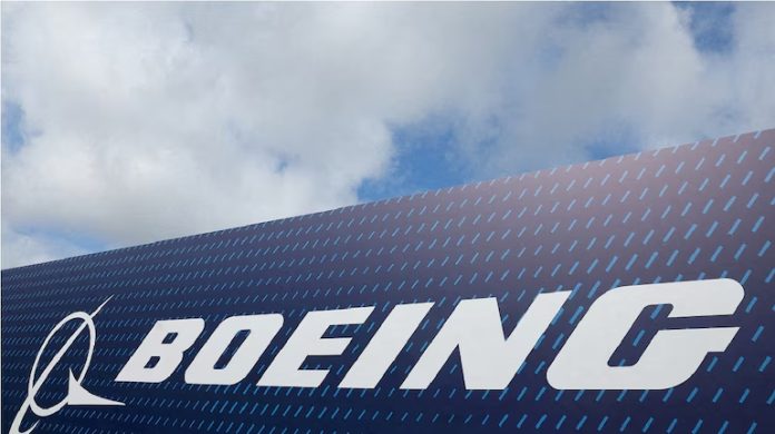 Boeing issues layoff notices to 400-plus workers as it begins drastic cuts