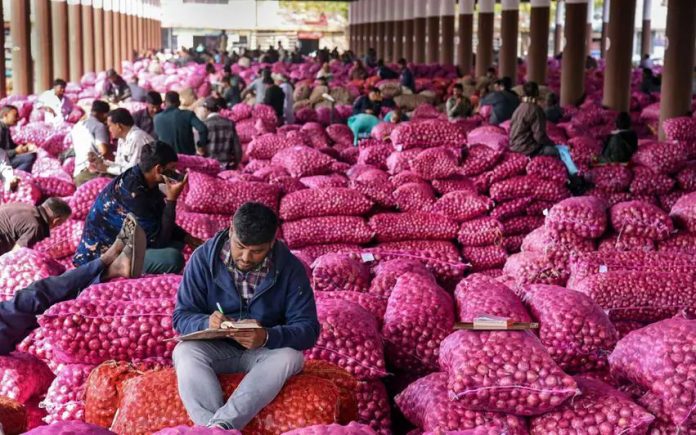 Onion prices likely to cool down further with arrival of new kharif crop: Govt official Onion prices likely to cool down further with arrival of new kharif crop: Govt official