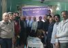 Mirpuries posing for a group photograph after paying tribute to the martyrs of Mirpur city.