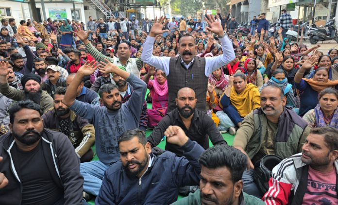 Civic Safai Karamcharis of JMC raising slogans during a protest demonstration in Jammu on Monday. -Excelsior/Rakesh Civic Safai Karamcharis of JMC raising slogans during a protest demonstration in Jammu on Monday. -Excelsior/Rakesh