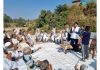 Cong leader Yogesh Sawhney addressing meeting in Jammu East segment on Monday.