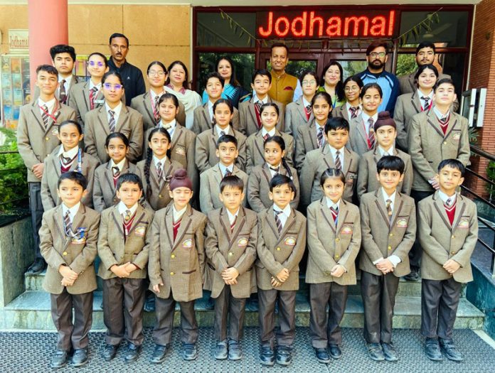 Skaters of Jodhamal Public School pose for a group photograph with their teachers. Skaters of Jodhamal Public School pose for a group photograph with their teachers.