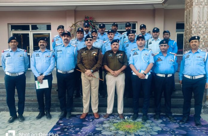 SSP Traffic Jammu Vinay Kumar with officers of Traffic Police after review meeting. SSP Traffic Jammu Vinay Kumar with officers of Traffic Police after review meeting.