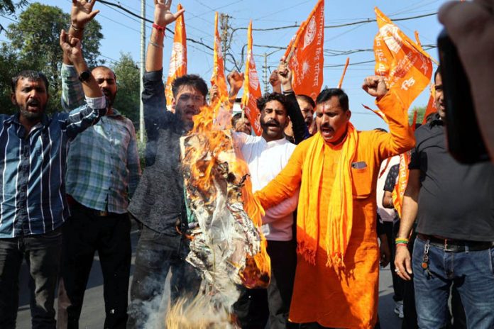 Members of Rashtriya Bajrang Dal protesting against National Conference president Dr Farooq Abdullah in Jammu on Monday. (UNI) Members of Rashtriya Bajrang Dal protesting against National Conference president Dr Farooq Abdullah in Jammu on Monday. (UNI)