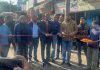 MLA Pawan Gupta formally launching blacktopping work of a road.