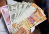 Rupee plunges 15 paise to settle  at 84.44 against US dollar