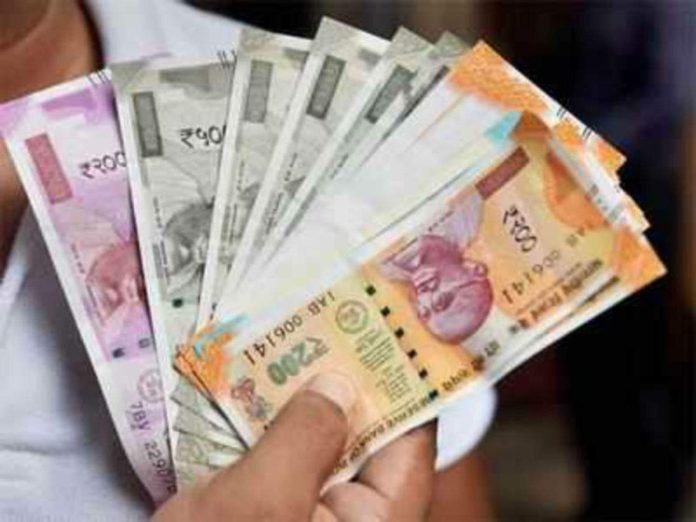 Rupee plunges 15 paise to settle at 84.44 against US dollar Rupee plunges 15 paise to settle at 84.44 against US dollar