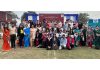 Delegates of different schools posing along with dignitaries during MUN conference.
