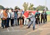 Sports Minister Satish Sharma testing his batting skills during inaugural event at Jammu.