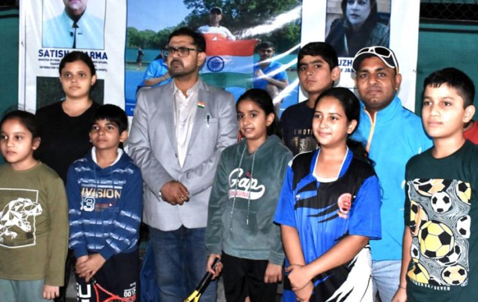 Minister for YS&S, Satish Sharma posing along with Soft Tennis players.