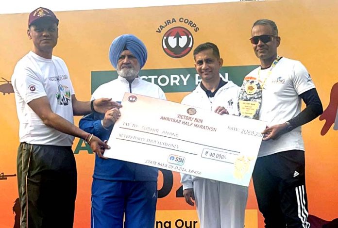 Runners from Jammu receive prize after excelling in first edition of Amritsar Half Marathon. Runners from Jammu receive prize after excelling in first edition of Amritsar Half Marathon.