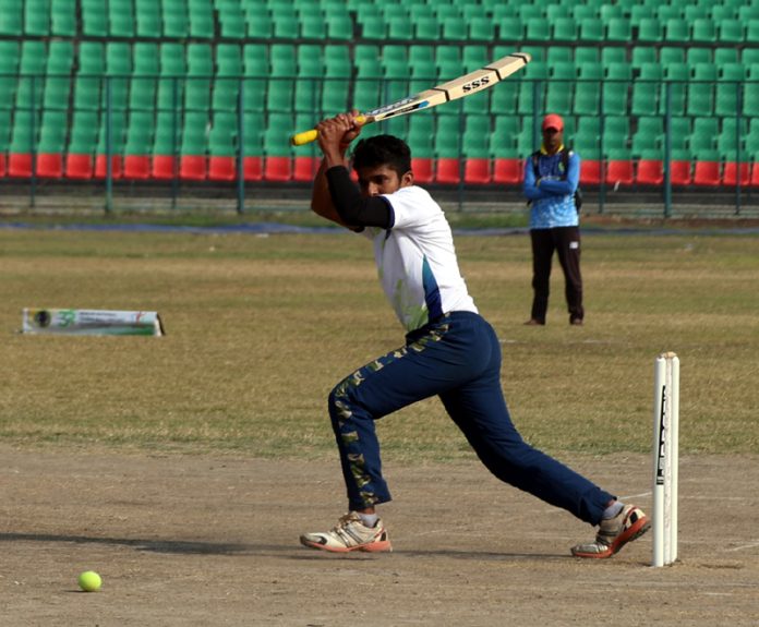 A player hits a shot during National Tennis Ball Cricket C’ship in Jammu. — Excelsior/Rakesh A player hits a shot during National Tennis Ball Cricket C’ship in Jammu. — Excelsior/Rakesh