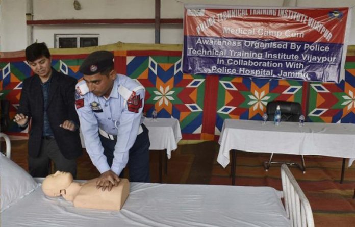 A police personnel learning life-saving CPR technique during a medical camp at PTTI Vijaypur on Tuesday.