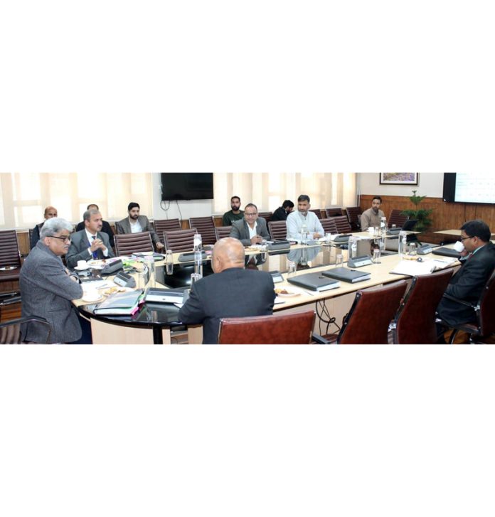 Chief Secy Atal Dulloo chairing a meeting.